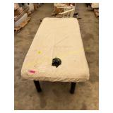 Massage table