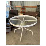 Glass top patio table