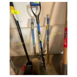 2 spades no handles and a shovel