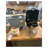 Suit case, glass jug, & more