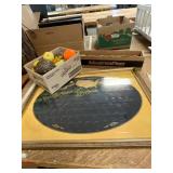 Fake fruit, apple candles, dollar coin board