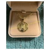 Unverified 22in Gold Figaro Chain Virgin Mary
