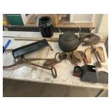Horse shoes, tea pot, irons