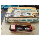 Drill press table, drill guide