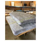 Two grey couch cushions