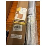 Two thing of blinds one white and one brown