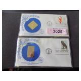 Two 14k gold stamps US 1st Day Issue Original
