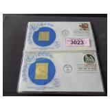 Two 14k gold stamps US 1st Day Issue Original