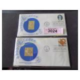Two 14k gold stamps US 1st Day Issue Original