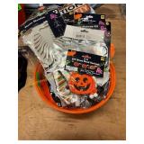 Assorted skeletons,treat bags and makeup