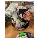 Assorted clown masks, gummies and candy holder