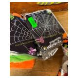 Assorted Halloween treat bags and fake webs