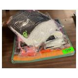 Assorted paper table covers, candy bag, spider web