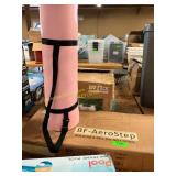 A pink yoga mat and a Aero step