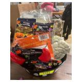 Halloween skeletons, vampire teeth, leaf bags