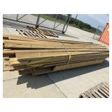 Pallet of assorted lumber green  treated