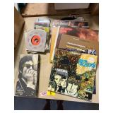 Vintage vinyl records and pile CDs