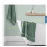 Purely indulgent bath towels green