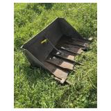 Trip loader bucket