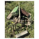 Pile of JD tractor parts