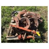 Assorted tractor weights and parts