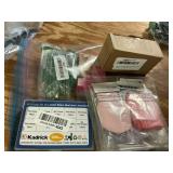 Baby gloves, screw head kit, hardware