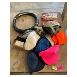 Assorted hats, microphones, wheel cover
