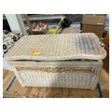 Wicker trunk and blankets