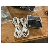 2 usbc-lightning cords, sticky note dispenser