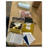 Thin blue plastic, foil balloons, glasses, beads