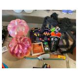Pumpkin decor, string lights, cat cups, spider