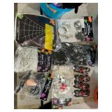 Spider webs, fake blood, handcuffs, funny glasses
