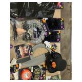 Pumpkin lights, vampire teeth, fake knives, spi
