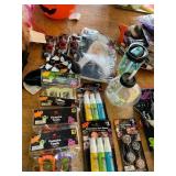 Vampire teeth, wig, fake blood, neon hair spray