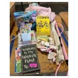 Art supples, books, bag, flag