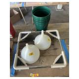 Funnels, flower pots, roller cart