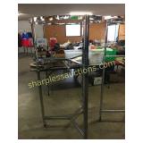 Round clothes rack on wheels