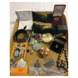 Tray full of jewelry