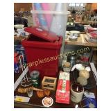 wrapping paper, trash can, jugs