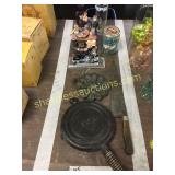 Cast iron pans, Pepsi bottle, misc
