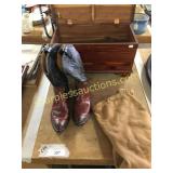 Cowboy boots, wood trunk