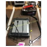 Portable DVD player, VHS, bow saw, misc.