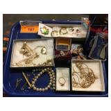 Tray full of jewelry