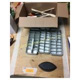 Iron, ice cube trays, kitchen untensils