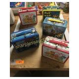 Lunch boxes, some with thermos