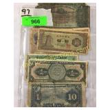 Foreign notes in plastic covers