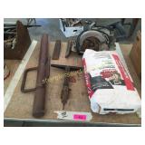 Splitting wedge, post pounder, skilsaw, misc