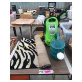 Watering can, pressure washer, rug