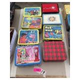 Lunch boxes, some with thermos