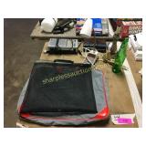 Bags, clock radio, lamps, Sprite pop bottle, sony